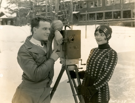 Sally and Nick Stuart during the filming of The News Parade (1928)